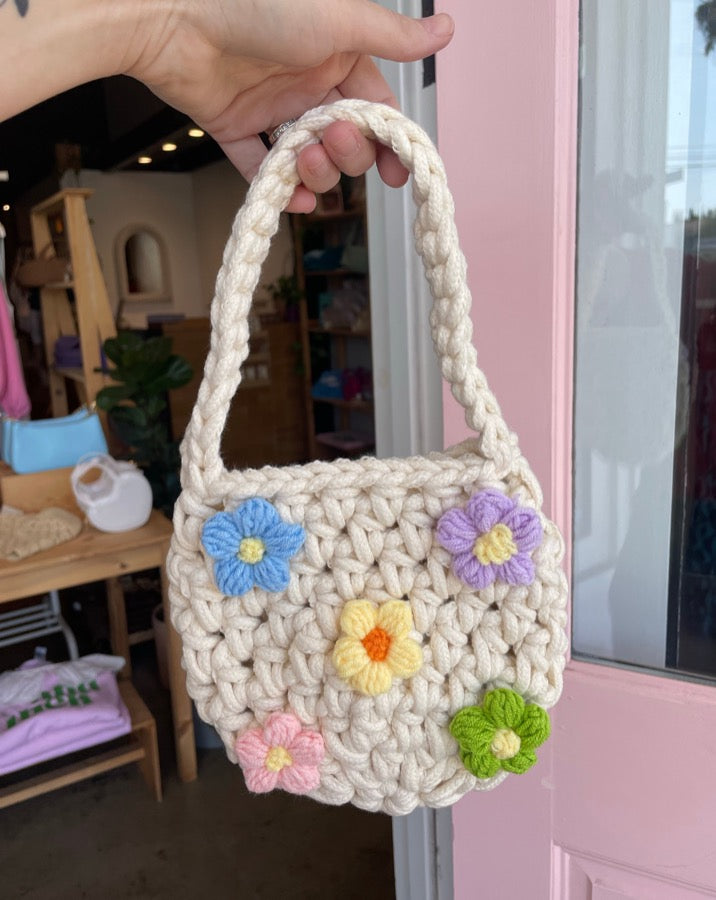 Tote bag with crochet flowers